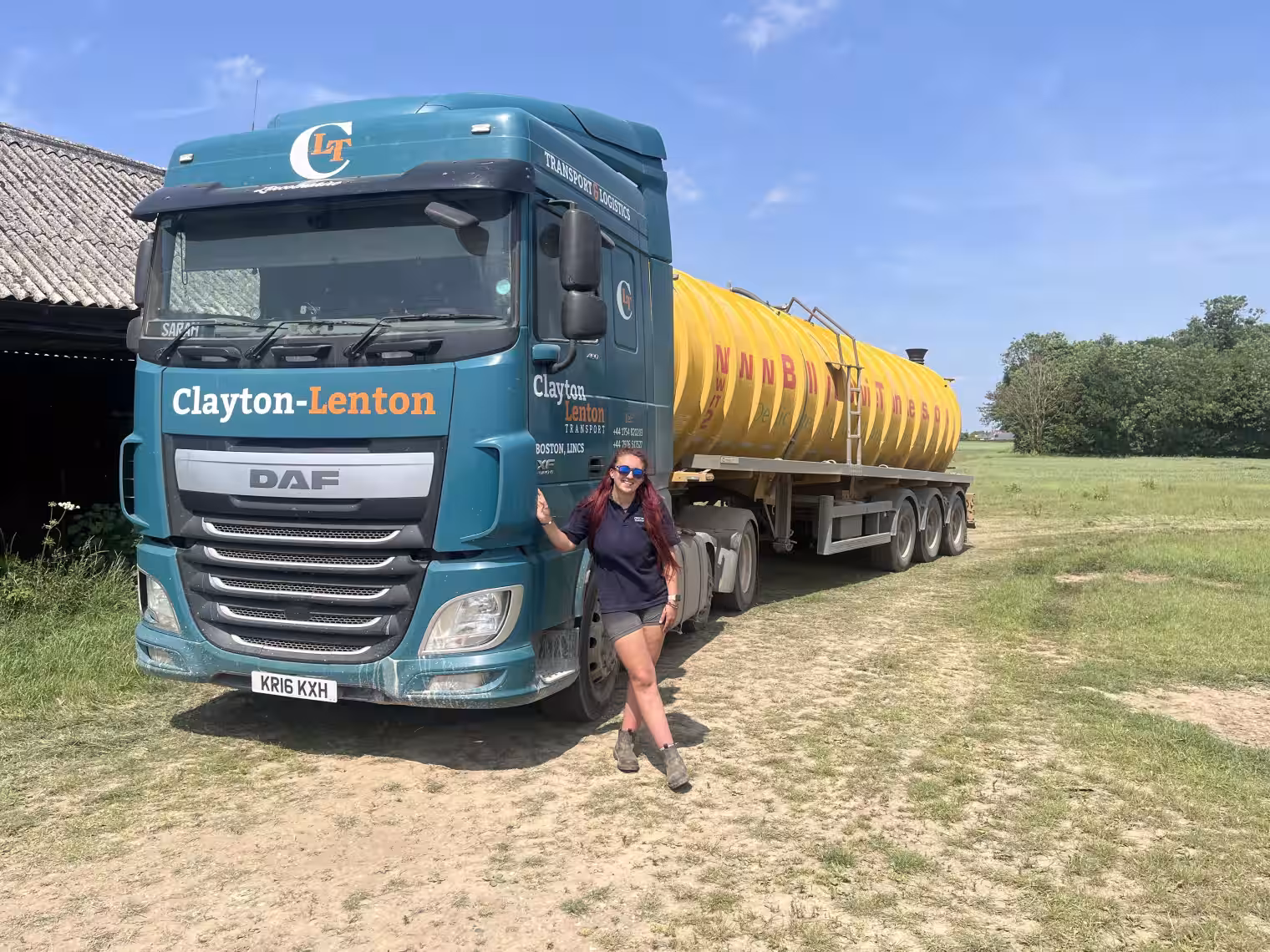 image of HGV trainee stood with HGV vehicle in field